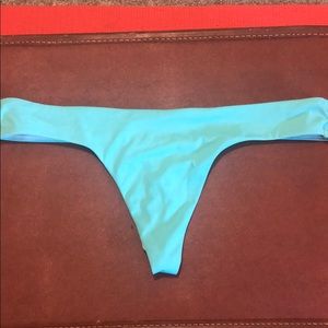 Teal Victoria’s Secret thong bathing suit